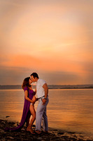 maternity couple on beach at sunset in Jamestown ri